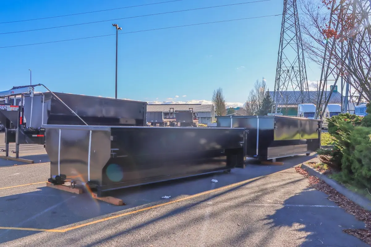 Roll-off dumpster ready for waste disposal at job site for 3 Yard Dumpster Rental in Connellsville